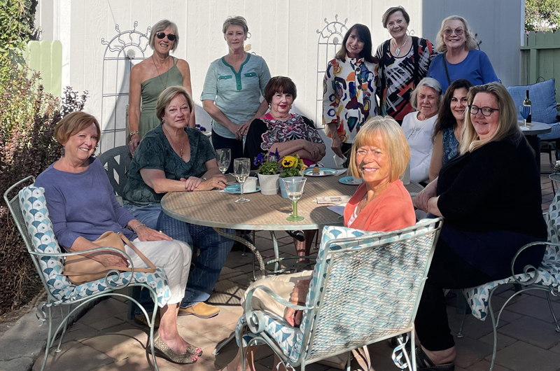 About 20 of Yvonne's friends dropped by Tuesday, May 17, to celebrate books and springtime in her botanical garden of a yard.