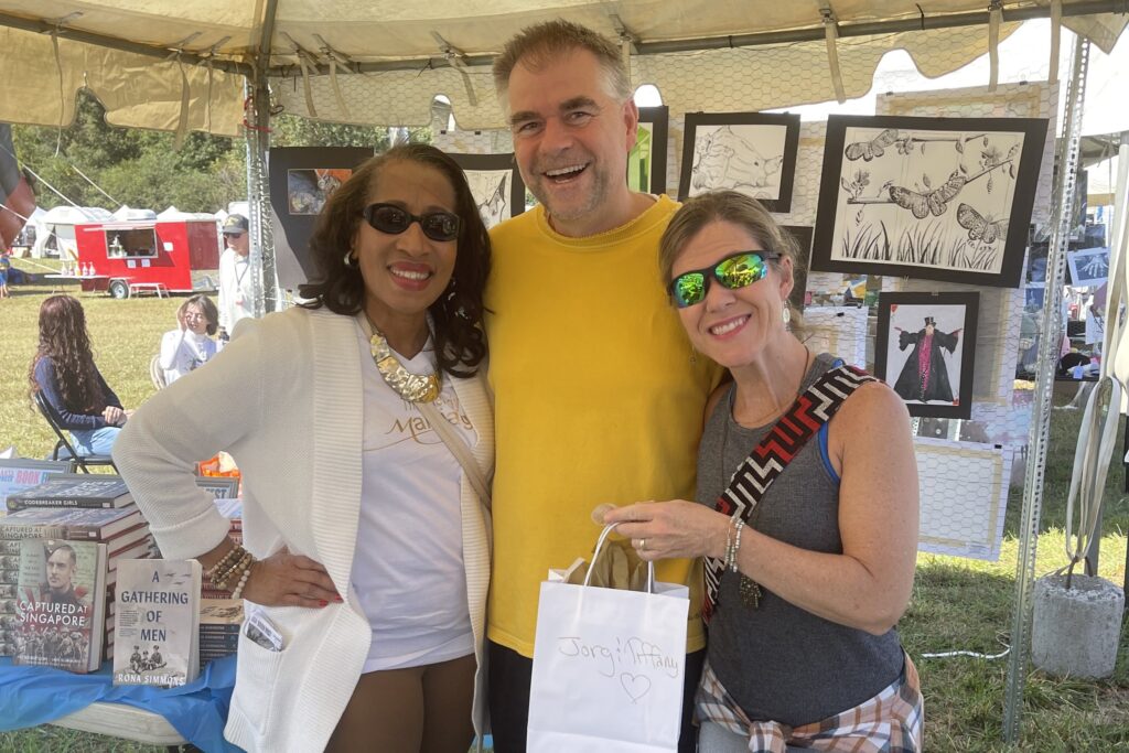 Author Cynthia D. Jones (left) with happy customers.